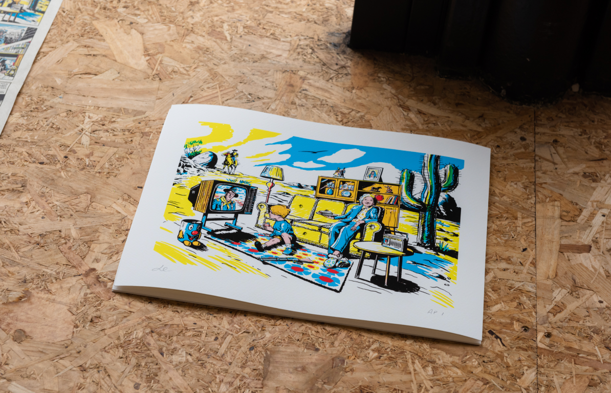Colorful illustration on a book lying on a wooden surface